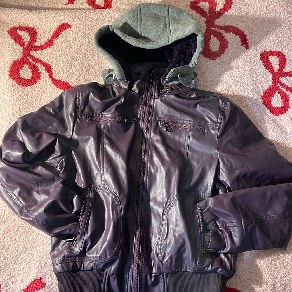 Women’s purple leather Jacket, has a bit of an opening but an easy fix!